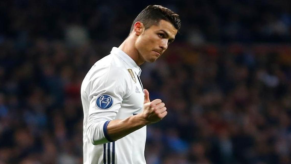Real Madrid's Cristiano Ronaldo gestures during the Champions League round of 16, first leg, soccer match between Real Madrid and Napoli at the Santiago Bernabeu stadium in Madrid, Wed. Feb. 15, 2017.