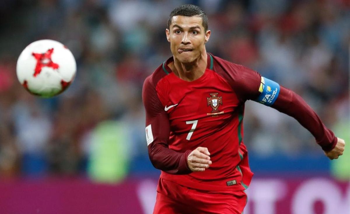 Portugal's Cristiano Ronaldo keeps his eyes on the ball during the Confederations Cup, semifinal soccer match between Portugal and Chile, at the Kazan Arena, Russia, Wed., June 28, 2017.