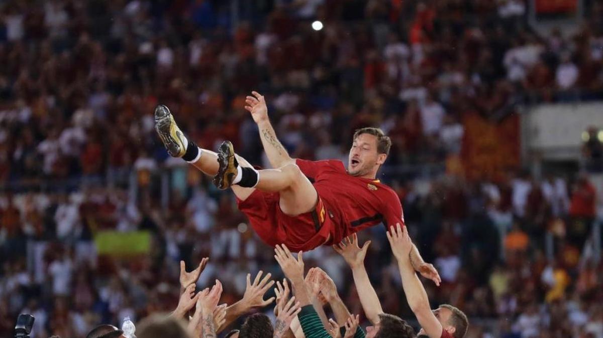 Italian legend Francecso Totti, tossed up by teammates after he played his final game for Roma on Sunday after 25 years with the club.