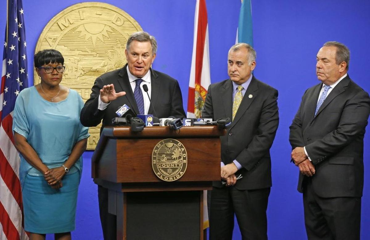 Miami-Dade County Commissioners voted to approve a $9 million land deal to David Beckham Group for a Miami soccer stadium on Tues., June 6, 2017. Here, Tim Leiweke, with the Beckham Group, speaking to the media after the vote. Left to right is Miami-Dade Commissioner Audrey M. Edmonson, Tim Leiweke, with the Beckham Group, Commissioner Esteban L. Bovo, Jr and attorney Neisen Kasdin,