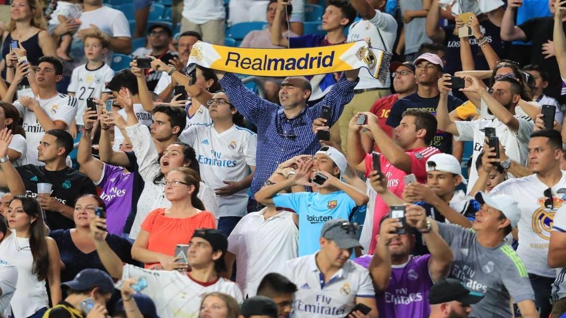 Fans react as Real Madrid soccer team arrives for practice at Hard Rock Stadium on Fri., July 28, 2017.