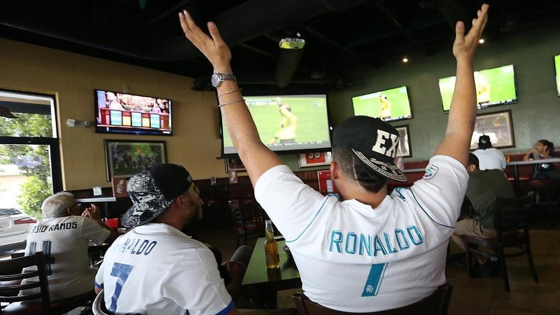 Real Madrid fans from the fan club Peña Madridista Sur de Florida watch a game against Manchester United at the Bru's Room Sports Grill on Sun., July 23, 2017 as the local buzz surrounding El Clasico Miami accelerates.