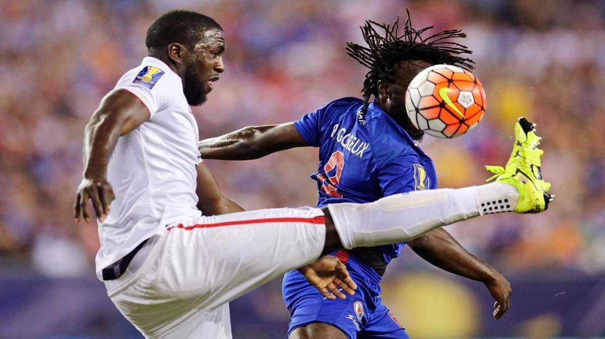 
Haiti's Reginal Goreux, right, tries to head the ball away as he is challenged by United States' Jozy Altidore during the first half of a CONCACAF Gold Cup soccer match in Foxborough, Mass., Friday, July 10, 2015.
