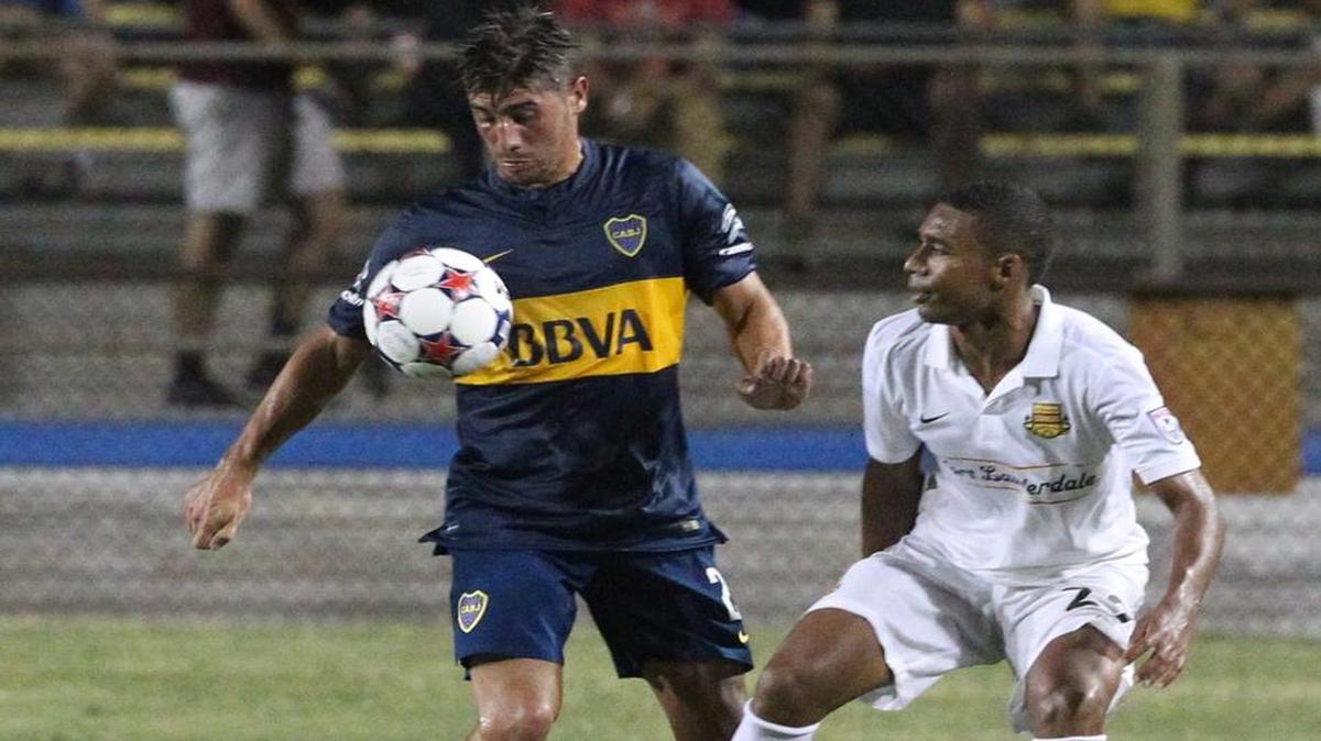 
Boca Juniors’ Cristian Erbes faces off with Fort Lauderdale Strikers’ Stefano Pinho in the second half at Lockhart Stadium on Wednesday, July 1, 2015
