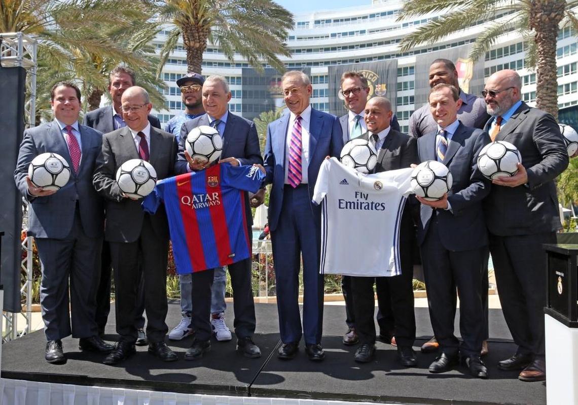 Miami Dolphins owner Stephen Ross (center) standing with local celebrities and soccer contingent, announces that FC Barcelona and Real Madrid soccer teams will meet on Saturday at Hard Rock Stadium as part of the 2017 International Champions Cup. Ross announced the event at the Fontainebleau Hotel on Miami Beach, March 10, 2017.