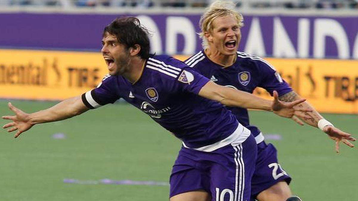 
Kaká (10) of Orlando City SC celebrates in front of teammate Brek Shea (20) after scoring the tying goal during the MLS match between New York City SC on Sunday, March 8, 2015 at the Citrus Bowl in Orlando. The game ended in a 1-1 tie. 
