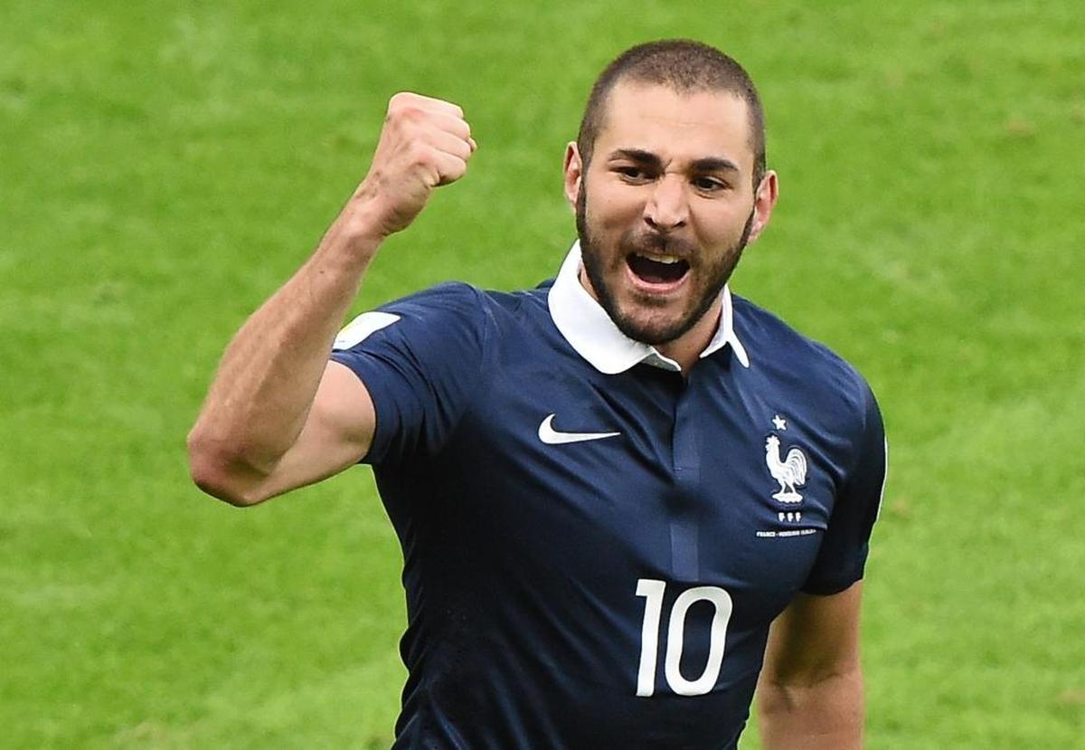 France's forward Karim Benzema celebrates after an own goal during a Group E football match between France and Honduras at the Beira-Rio Stadium in Porto Alegre during the 2014 FIFA World Cup on June 15, 2014.