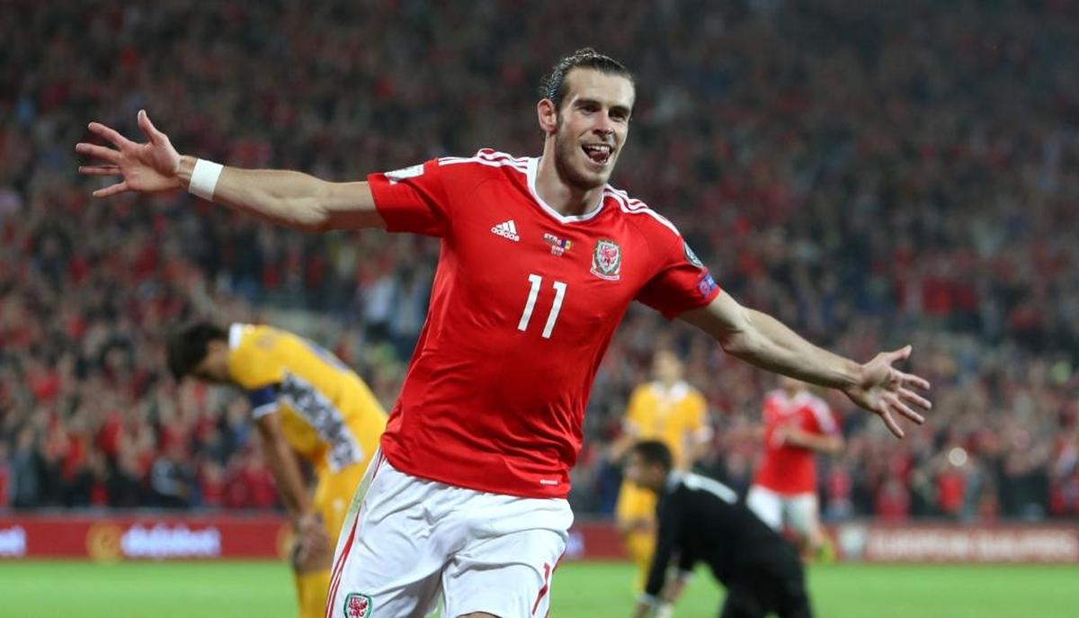 Wales' Gareth Bale celebrates scoring against Moldova during the 2018 World Cup qualifying group D soccer match at the Cardiff City Stadium, Wales, Mon. Sept. 5, 2016.