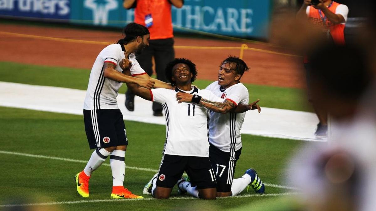 Juan Guillermo Cuadrado (11) of Colombia celebrates with his teammates after scoring during their game against Haiti at Marlins Park on May 29, 2016. At the end of regulation Columbia outplayed Haiti and defeated them 3-1.