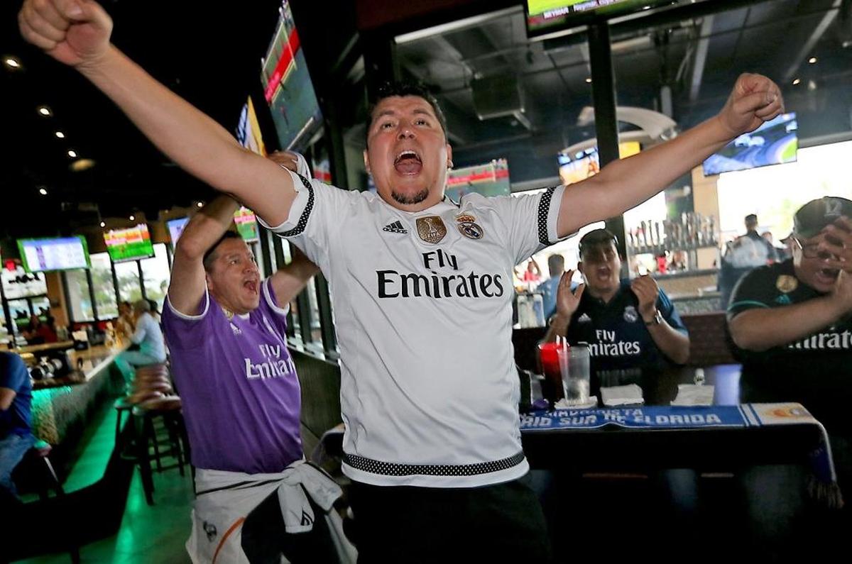 Real Madrid fan Moses Benavides of Aventura and other members of the fan club Peña Madridista Sur de Florida watch a game against Manchester United at the Bru's Room Sports Grill on Sun., July 23, 2017 as the local buzz surrounding El Clasico Miami accelerates.