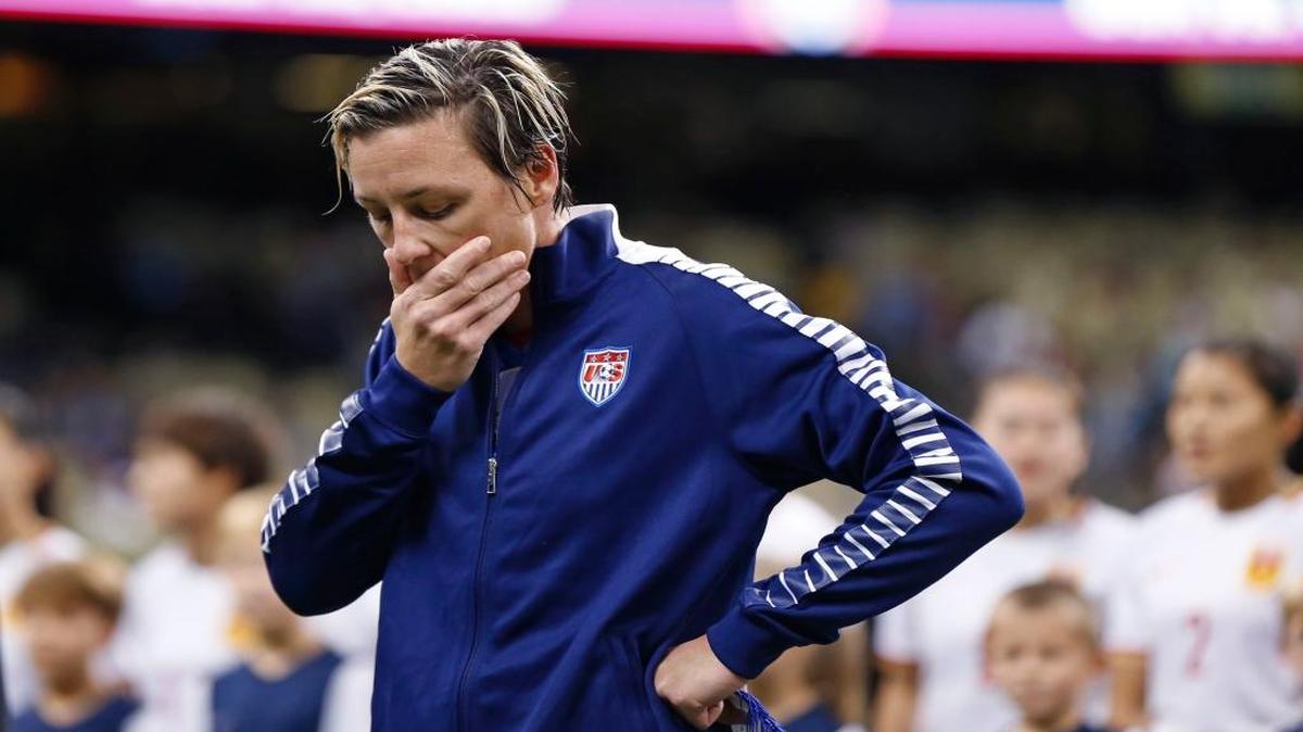 U.S. forward Abby Wambach reacts during a presentation to her before the team's international friendly soccer match against China in New Orleans, Wednesday, Dec. 16, 2015. Wambach retired from international competition after the game.