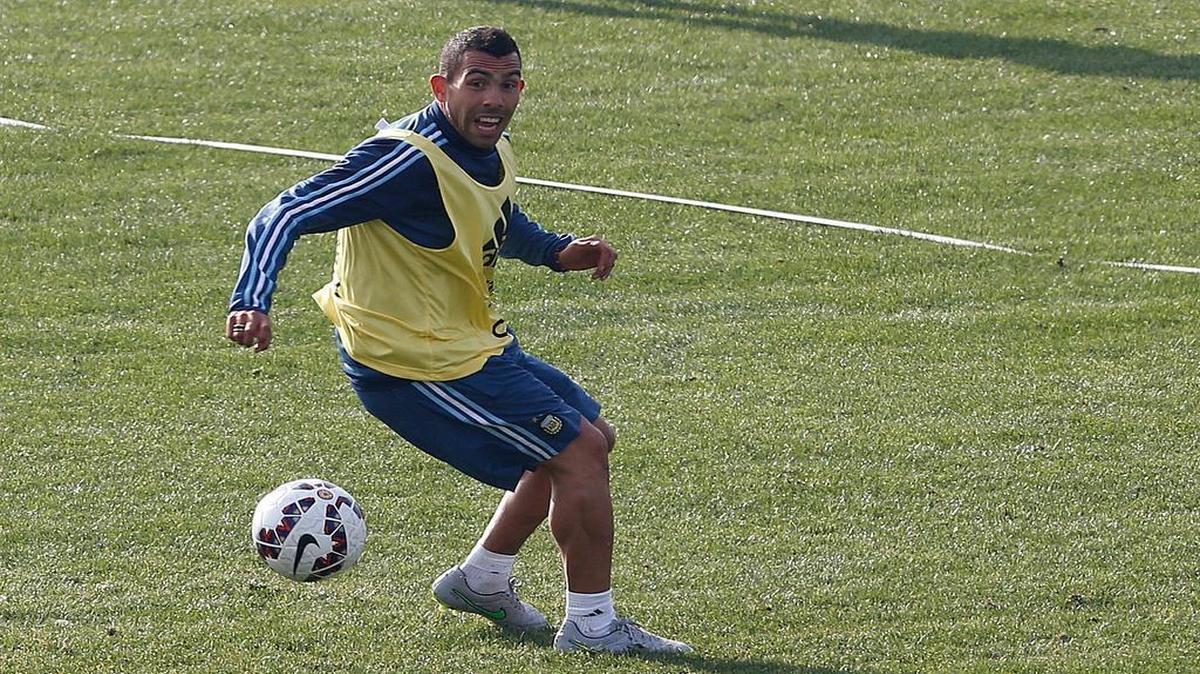 
Argentina's Carlos Tevez trains in Vina del Mar, Chile, Saturday, June 27, 2015. Argentina defeated Colombia 5-4 on penalties after a 0-0 draw on Friday to reach the semifinals of the Copa America.
