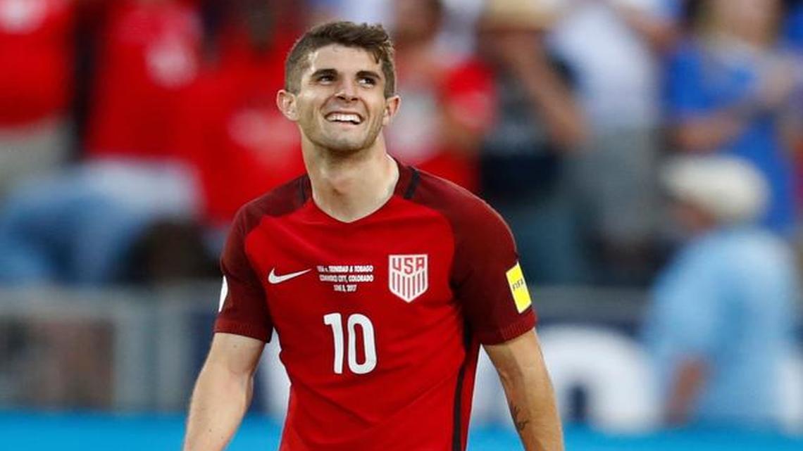 U.S. midfielder Christian Pulisic smiles as time runs out in the team's World Cup soccer qualifying match against Trinidad & Tobago on Thursday, June 8, 2017, in Commerce City, Colo. The United States won 2-0.