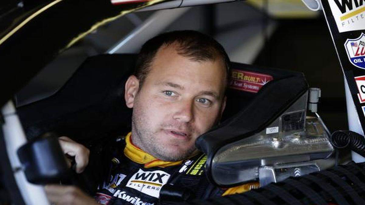 
In this Oct. 31, 2014, file photo, Sprint Cup Series driver Ryan Newman sits in his car in the garage during practice at Texas Motor Speedway in Fort Worth, Texas. Newman, Joey Logano, Kevin Harvick and Denny Hamlin will race Sunday, Nov. 16, 2014, at Homestead-Miami Speedway for the championship. 
