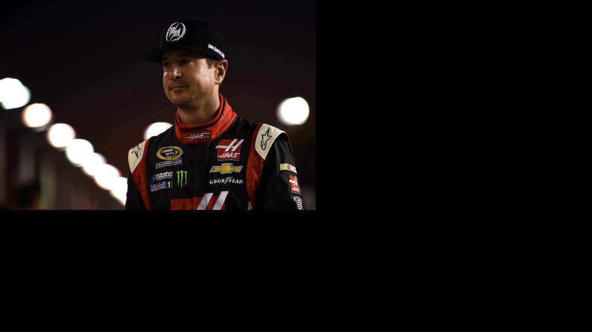 
Kurt Busch, driver of the #41 Haas Automation Chevrolet, stands on the grid during qualifying for the NASCAR Sprint Cup Series Ford EcoBoost 400 at Homestead-Miami Speedway on November 14, 2014 in Homestead, Florida.
