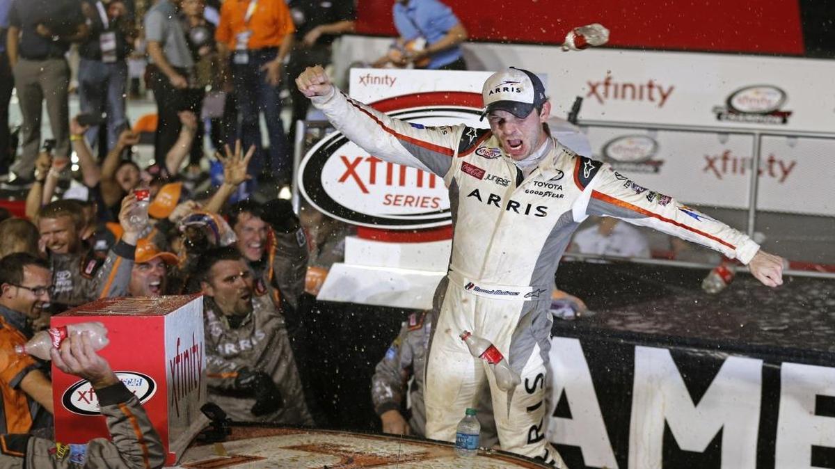 Daniel Suarez celebrates after winning the Ford EcoBoost 300 during Championship Weekend at Homestead-Miami Speedway on Saturday, November 19, 2016