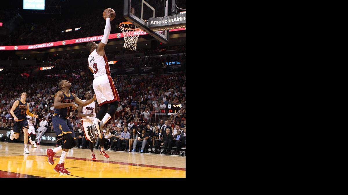 
Dwyane Wade goes to the basket in the second quarter of the Miami Heat's game against the Cleveland Cavaliers at AmericanAirlines Arena in Miami on March 16, 2015.
