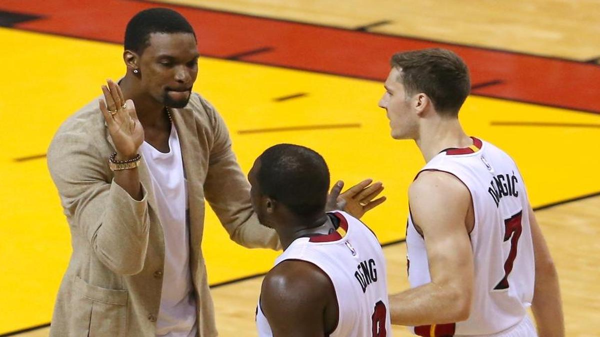 The Miami Heat must figure out what it wants to do with forward Chris Bosh, left, who has been sidelined for much of the past two seasons while dealing with blood clots. Guard Goran Dragic, (7) is one of seven players under contract or with team-favorable options for next season while Luol Deng, (9) will head into free agency.