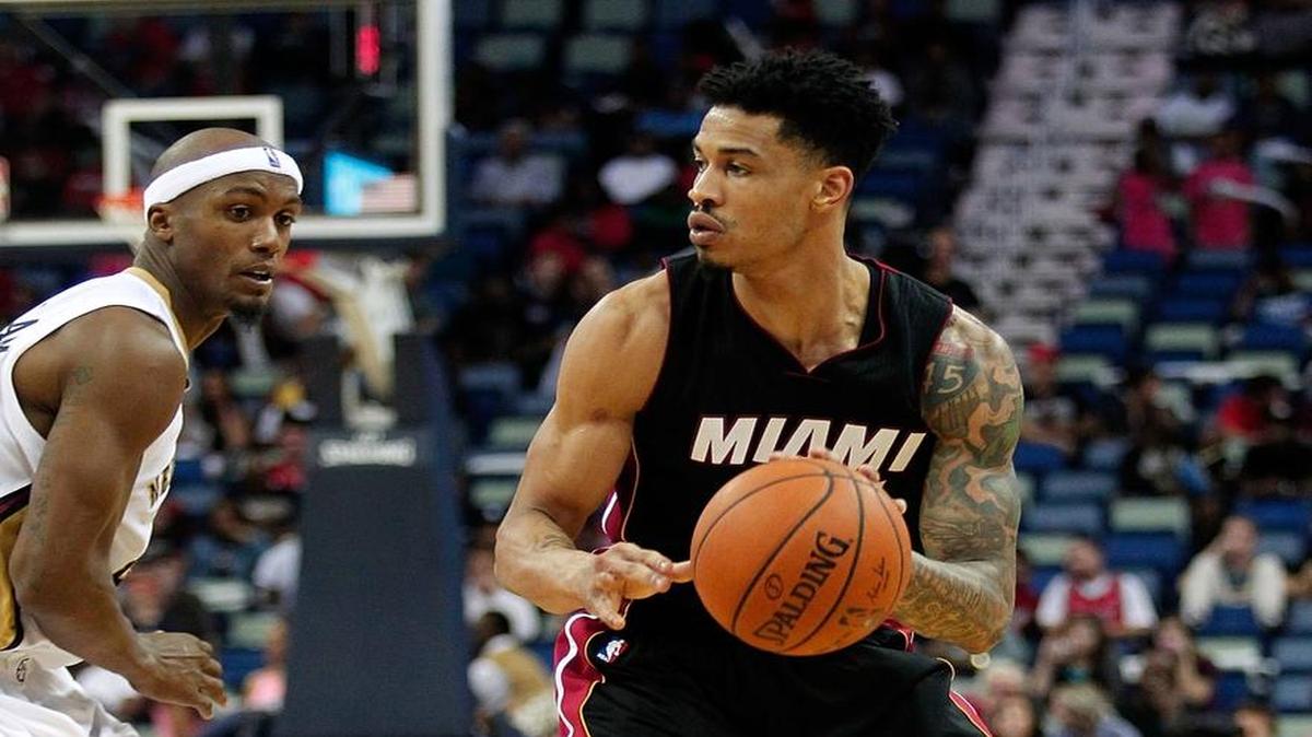 Miami Heat guard Gerald Green (14) drives past New Orleans Pelicans forward Dante Cunningham (44) during the second half of an NBA preseason basketball game in New Orleans, Friday, Oct 23, 2015. The Pelicans won 93-90.