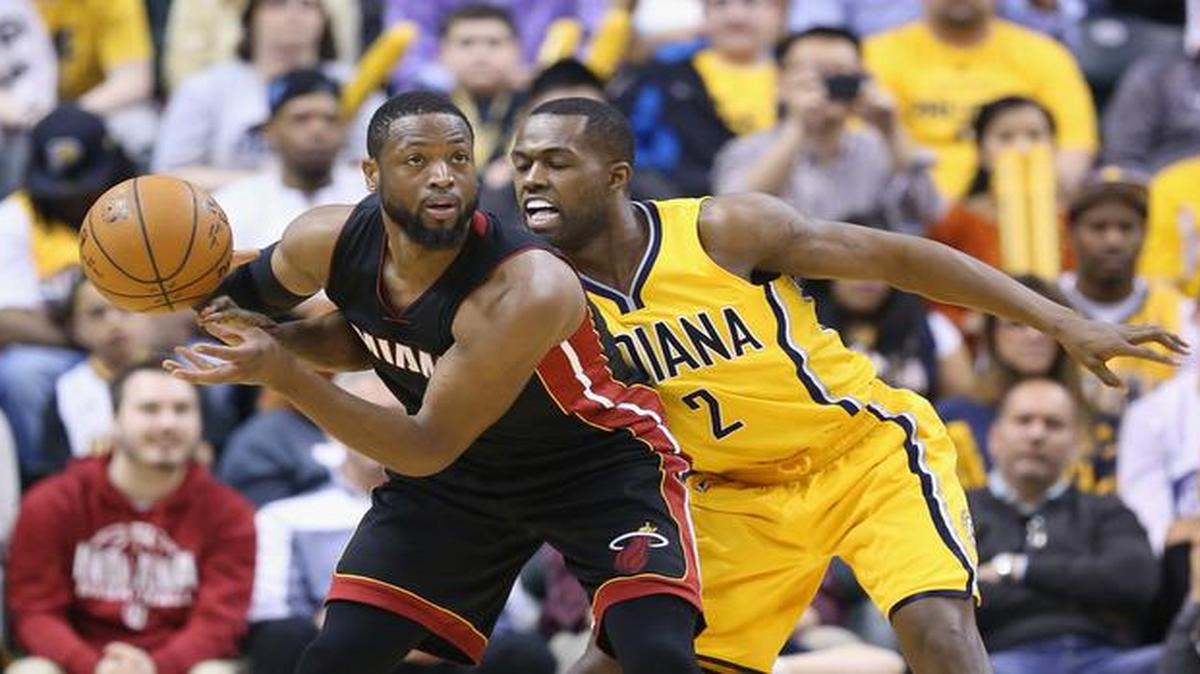 
Rodney Stuckey #2 of the Indiana Pacers guards Dwayne Wade #3 of the Miami Heat at Bankers Life Fieldhouse on April 5, 2015 in Indianapolis, Indiana.
