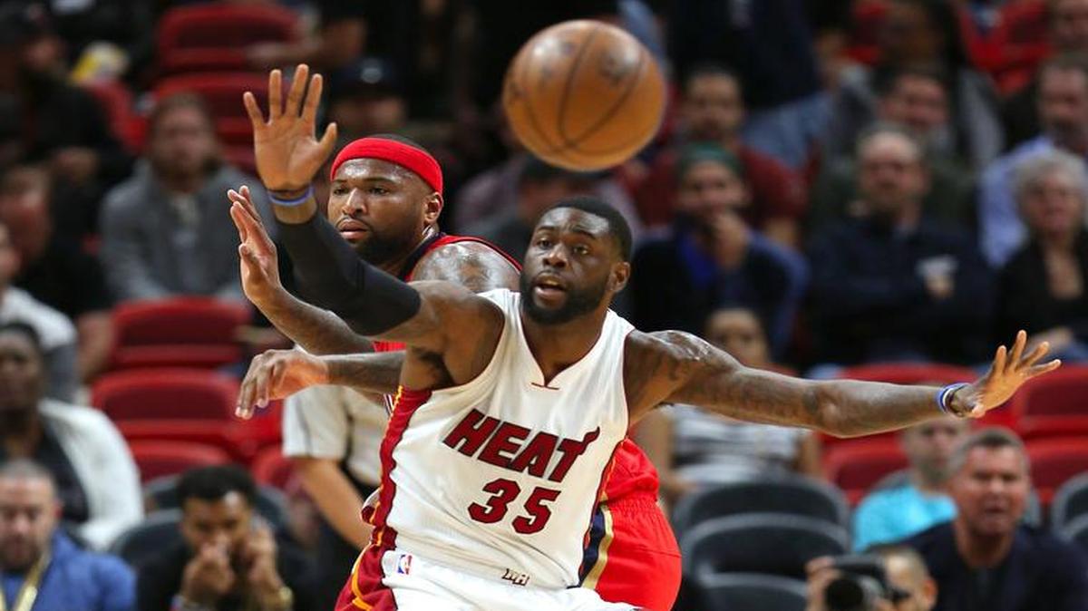 Miami Heat forward Willie Reed fights for position under the basket against New Orleans Pelicans forward DeMarcus Cousins during the first quarter of an NBA game at AmericanAirlines Arena in Miami on Wednesday, March 15, 2017.