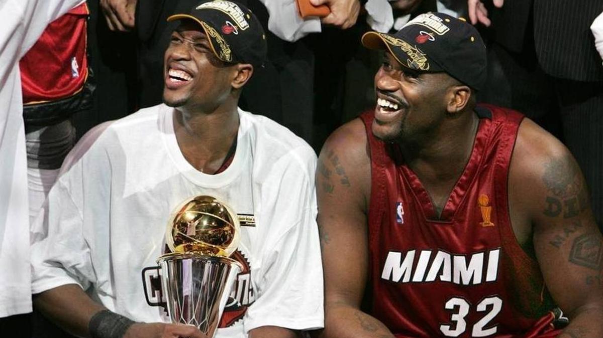 Dwyane Wade, the MVP of the 2006 NBA Finals, celebrates the Heat’s first title after a Game 6 win in Dallas with teammate Shaquille O’Neal.