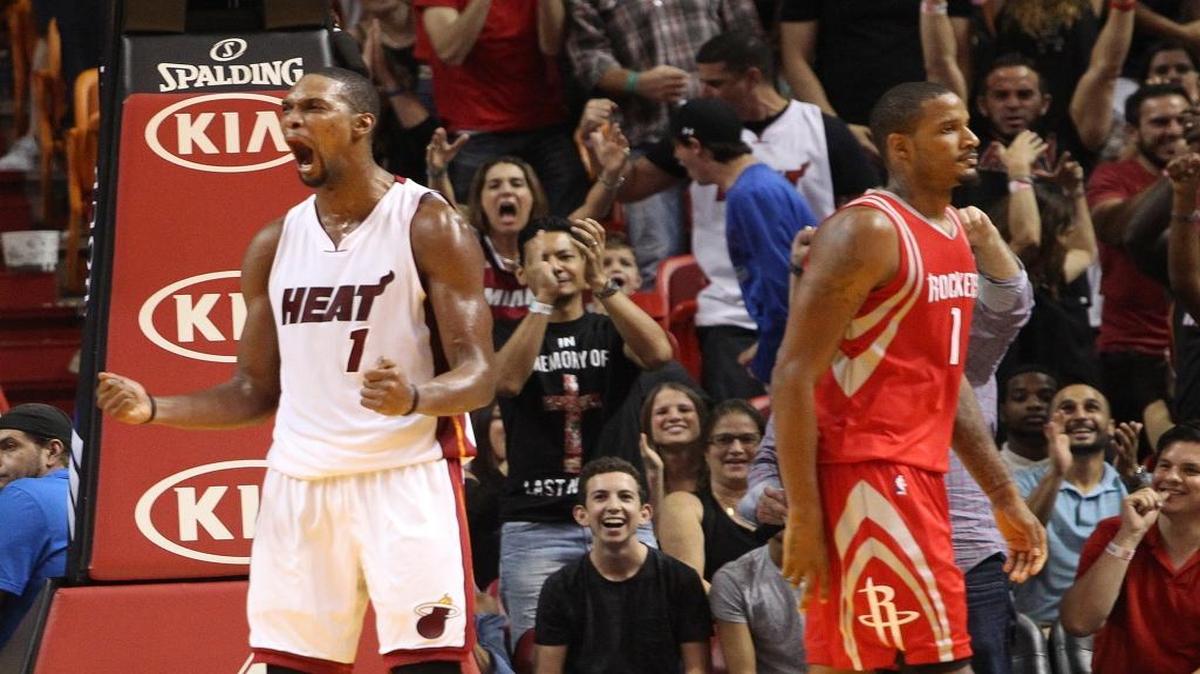 Chirs Bosh of the Miami Heat reacts after scoring in the fourth quarter during the game Miami Heat vs Houston Rockets on Sunday, November 1, 2015 at the AmericanAirlines Arena.