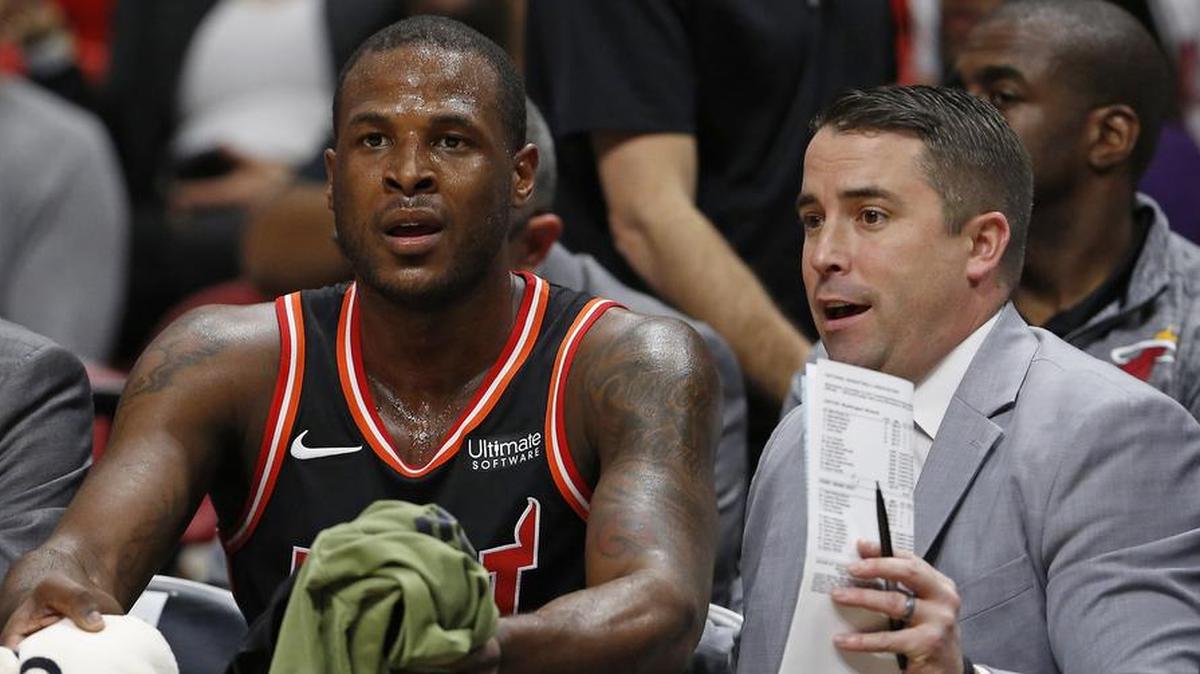 Miami Heat assistant coach Dan Craig talks with Heat guard Dion Waiters during the first quarter of a game against the Washington Wizards at the AmericanAirlines Arena in Miami on Wednesday, November 15, 2017.