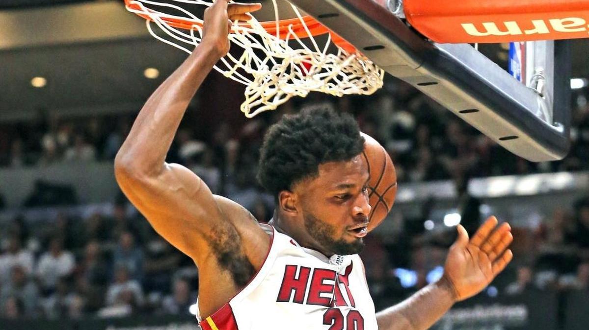The Miami Heat’s Justise Winslow slam dunks the ball in the second quarter against the Chicago Bulls at the AmericanAirlines Arena in Miami on March 29, 2018.