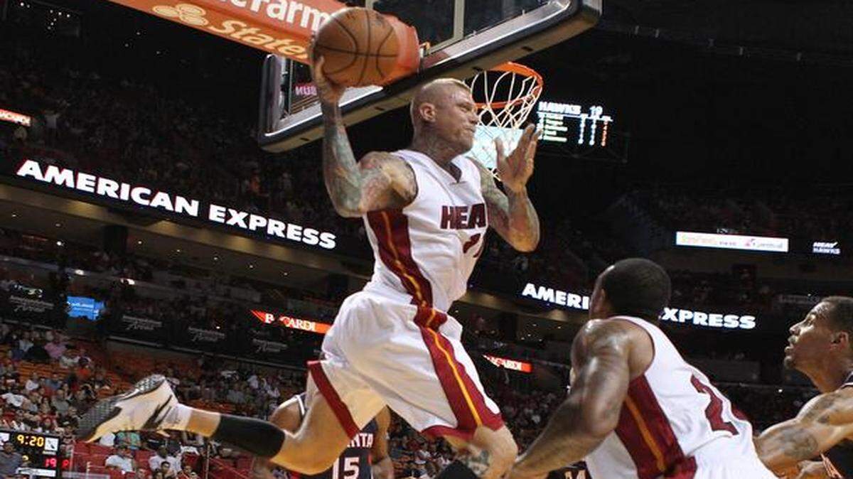 <cutline_leadin>Aerial survey:</cutline_leadin> Heat forward Chris Andersen looks to pass during the second quarter of Tuesday’s preseason game against the Hawks at AmericanAirlines Arena.