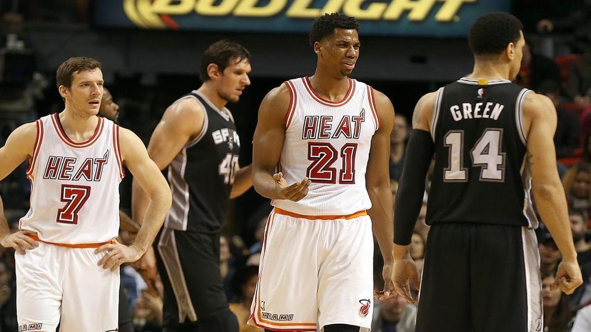 Goran Dragic and Hassan Whiteside react during the Miami Heat’s game against the San Antonio Spurs on Tuesday, Feb. 9, 2016 at AmericanAirlines Arena.