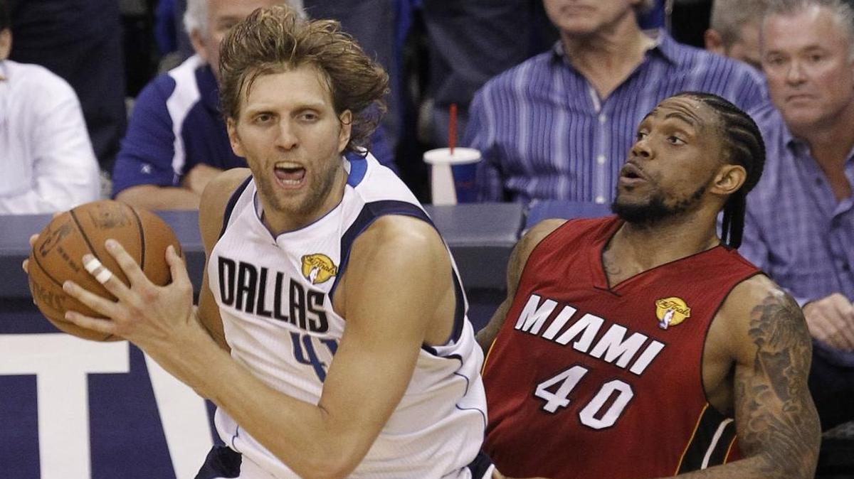 Dirk Nowitzki goes against Udonis Haslem as the Miami Heat are defeated 86-83 by the Dallas Mavericks in Game 4 of the NBA Finals at American Airlines Center in Dallas on Tues. June 7, 2011.