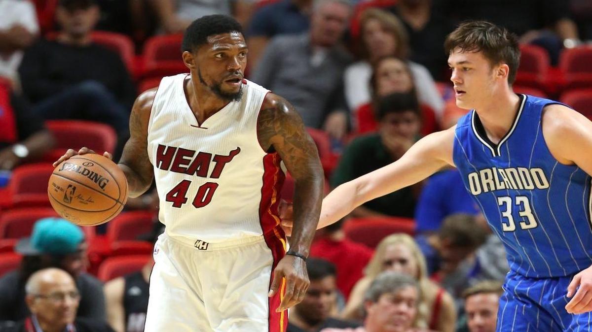Miami Heat forward Udonis Haslem drives against the Orlando Magic center Stephen Zimmerman Jr. in the fourth quarter of an preseason NBA basketball game at AmericanAirlines Arena on Tuesday, Oct. 18, 2016, in Miami.
