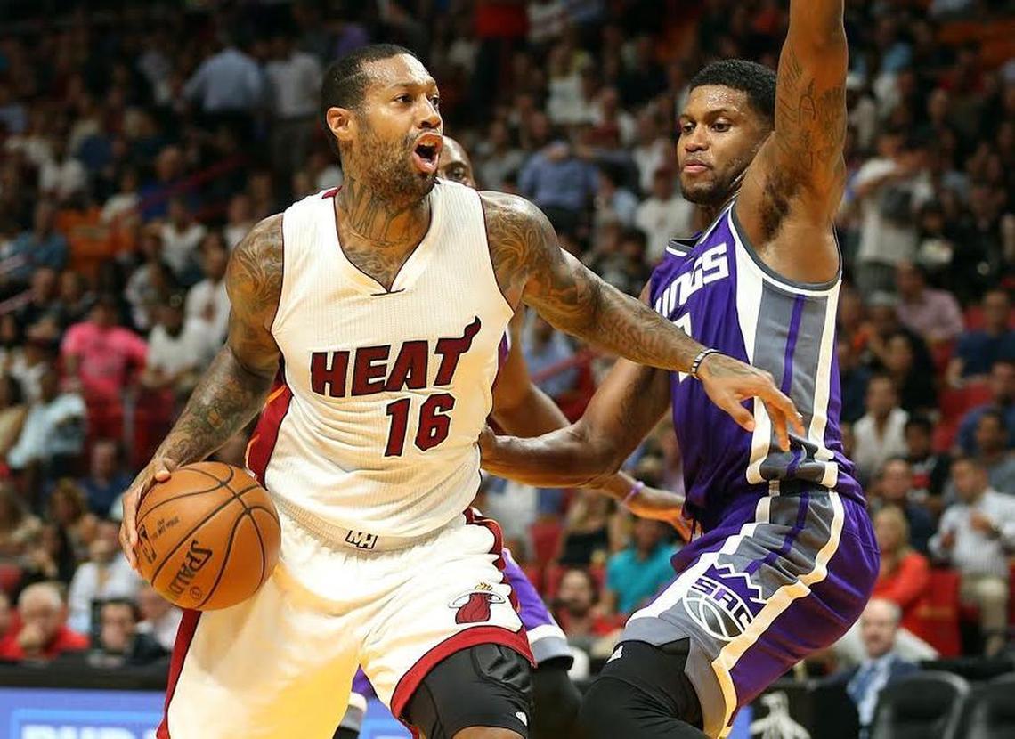 Miami Heat’s forward James Johnson drives against Kings’ forward Rudy Gay in the second quarter of the Heat’s win at AmericanAirlines Arena in Miami on Tues., November 1, 2016.