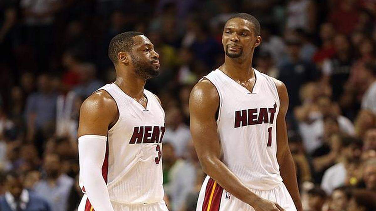 
Leading the way: Heat guard Dwyane Wade, left, is 10th in the league in scoring at 22.1 points and center Chris Bosh ranks 12th at 21.6.
