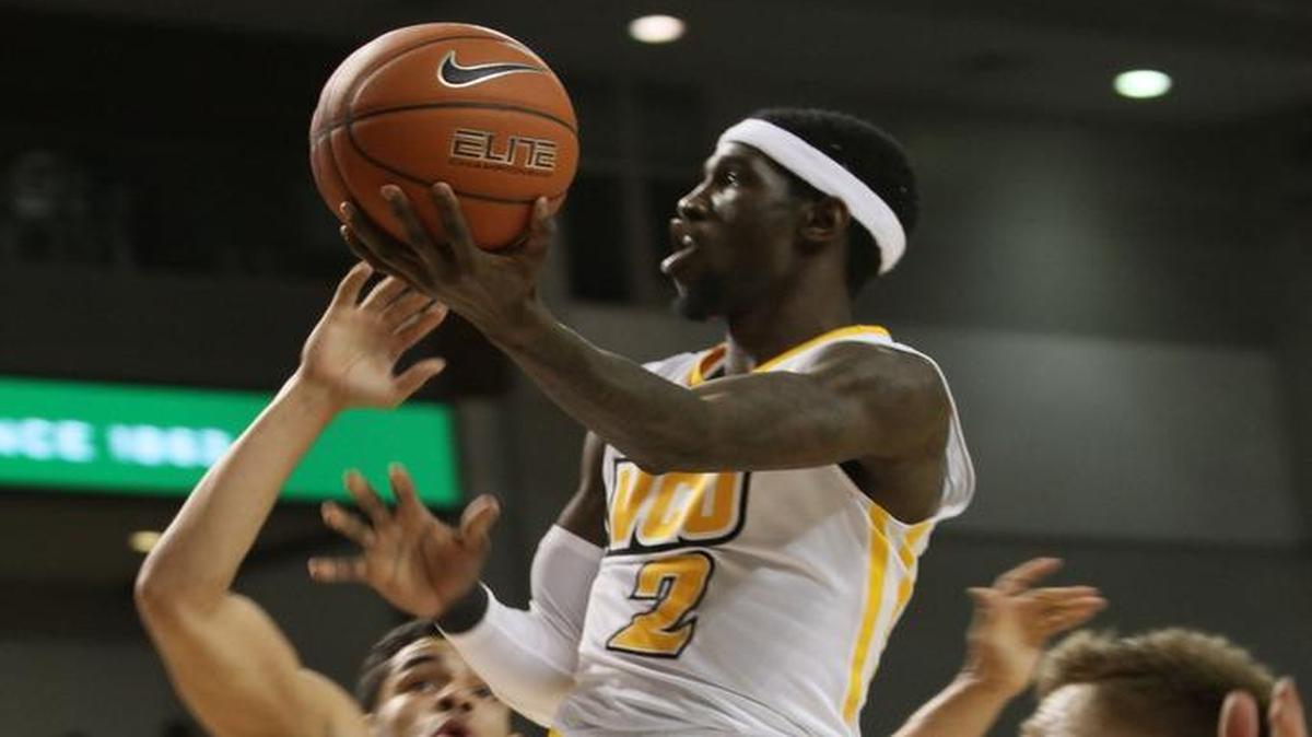 VCU’s Briante Weber (2) drives for two points during the first half against Davidson in Richmond, Va., Wednesday, Jan. 7, 2015.