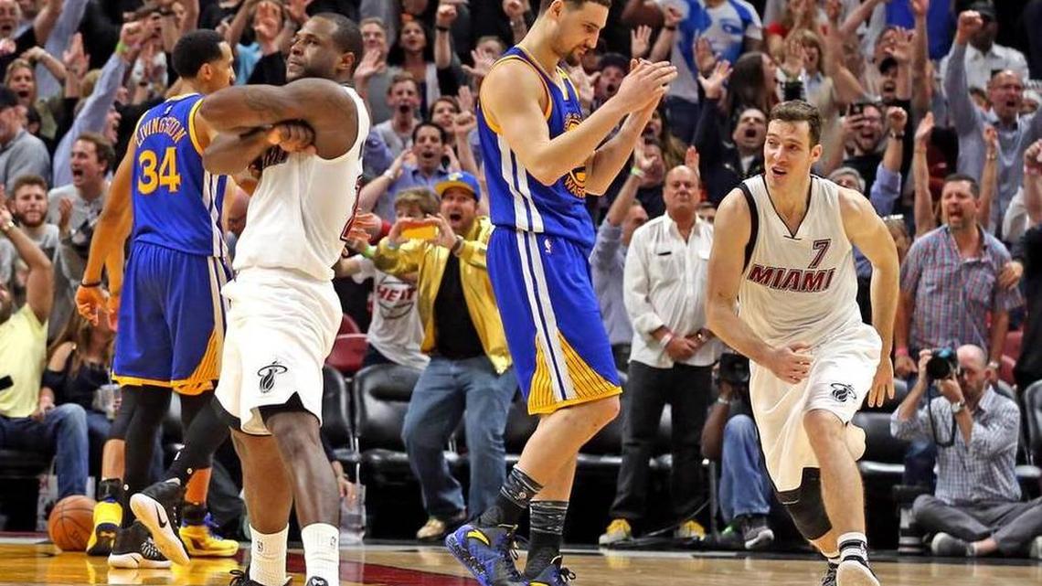 Miami Heat guard Dion Waiters poses for the fans after shooting a basket over Golden State Warriors guard Klay Thompson in the final seconds of the game to secure the Heat’s victory over the Golden State Warriors at the AmericanAirlines Arena in Miami on Jan. 23, 2017.