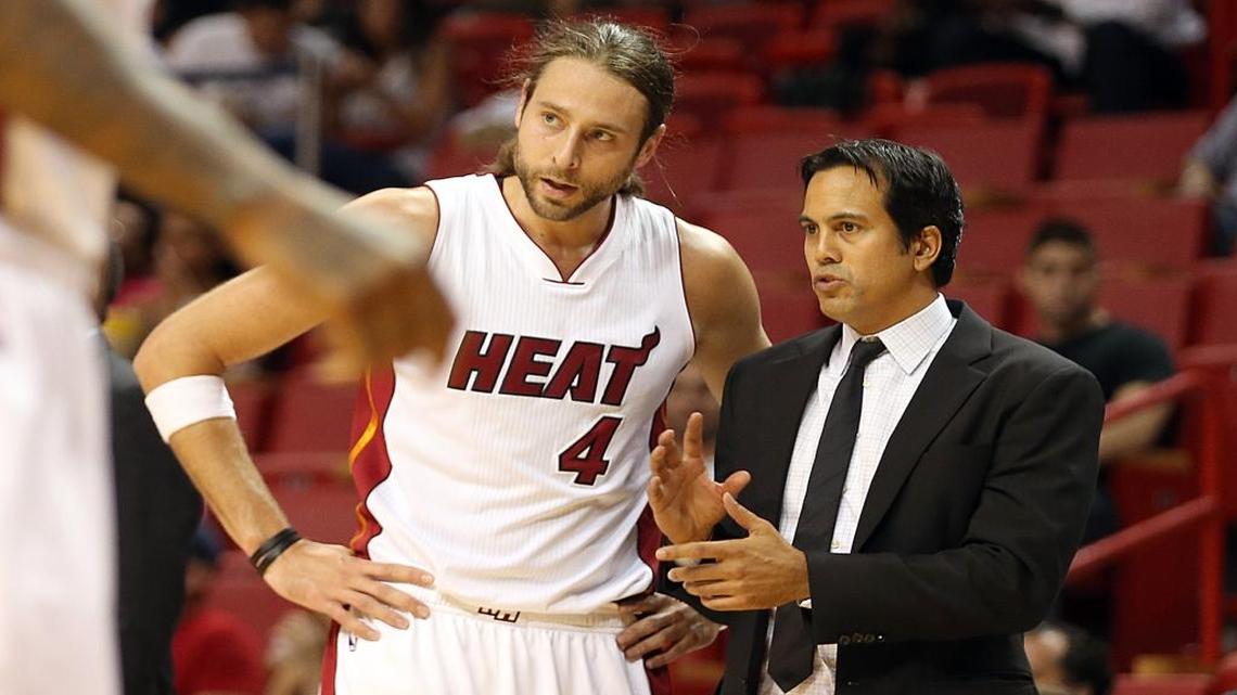 Josh McRoberts speaks with Miami Heat coach Erik Spoelstra during the team’s preseason game against the Washington Wizards on Oct. 21, 2015.