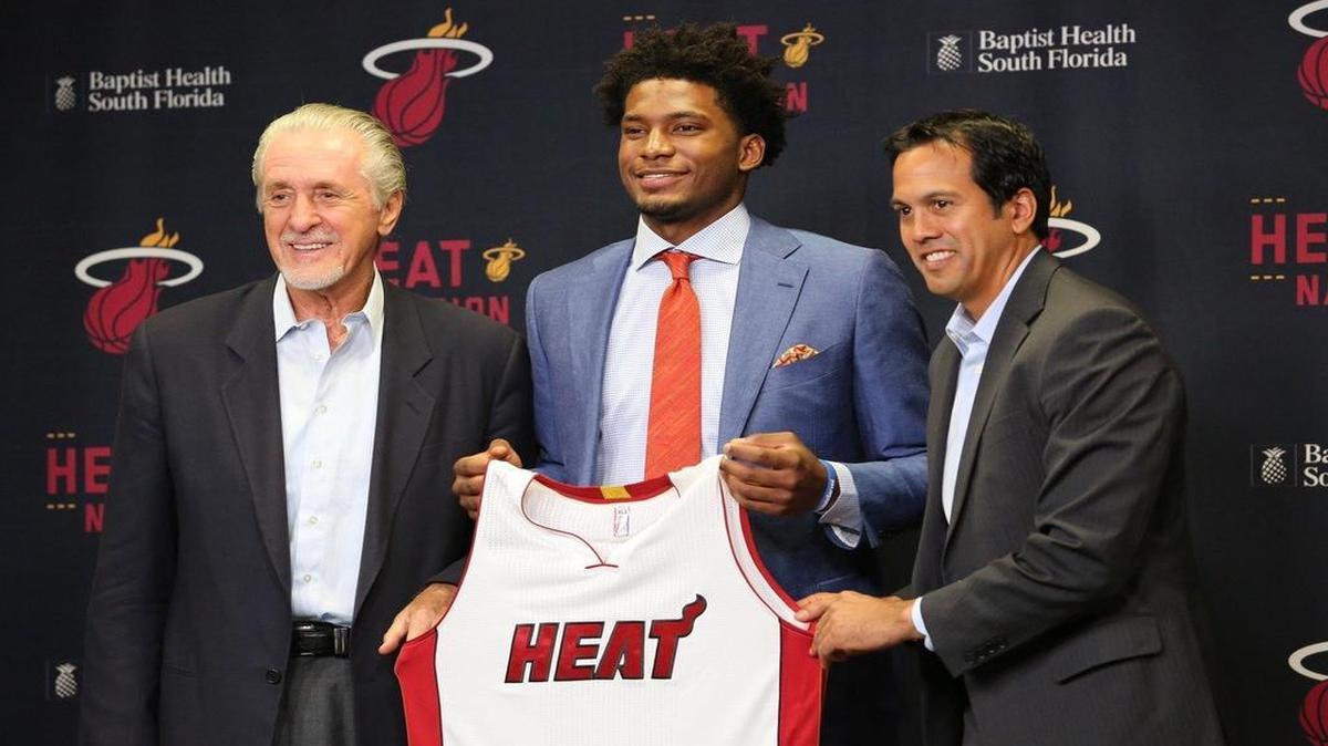 
Heat president Pat Riley, left, and coach Erik Spoelstra, right,introduce Justise Winslow on Monday. ‘It’s tougher to find the ‘it’ quality in players, and that’s why we were so excited to be able to get Justise at the 10th pick,’ Spoelstra said.
