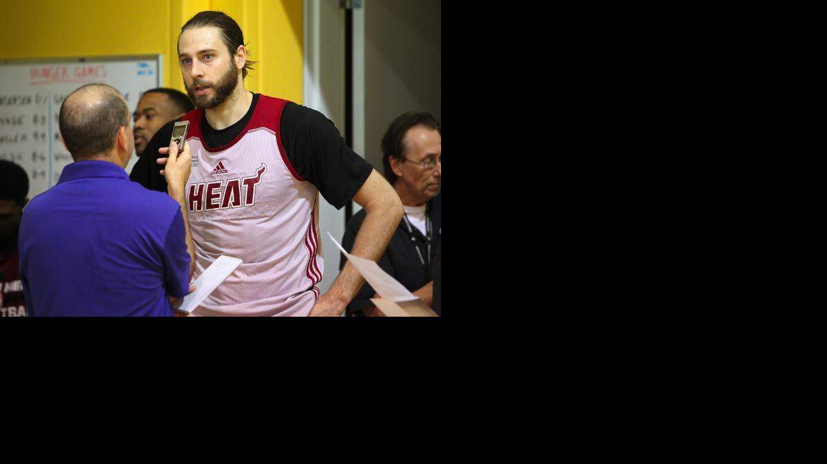 
Miami Heat forward Josh McRoberts talks with the media during team practice at the AmericanAirlines Arena in Miami on Nov. 11, 2014, in preparation for a regular-season game against the Indiana Pacers.
