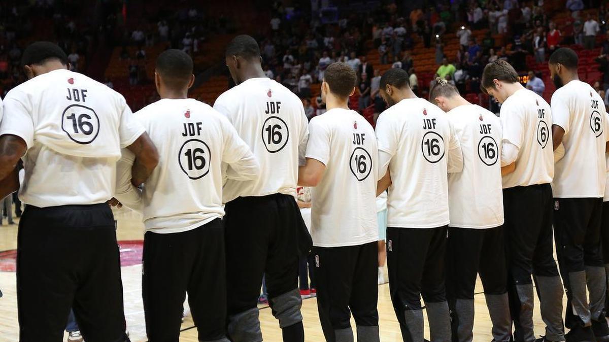 The Miami Heat honor late Marlins pitcher Jose Fernandez with moment of silence before the start of an preseason NBA basketball game against the the Brooklyn Nets at American Airlines Arena on Tues., Oct. 11, 2016, in Miami.
