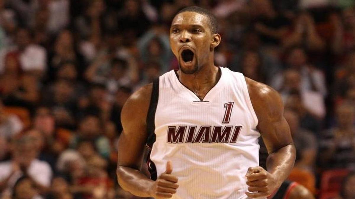 Chris Bosh reacts after scoring in the fourth quarter of the Miami Heat’s game against the Portland Trail Blazers on Sunday, Dec. 20, 2015 at AmericanAirlines Arena.