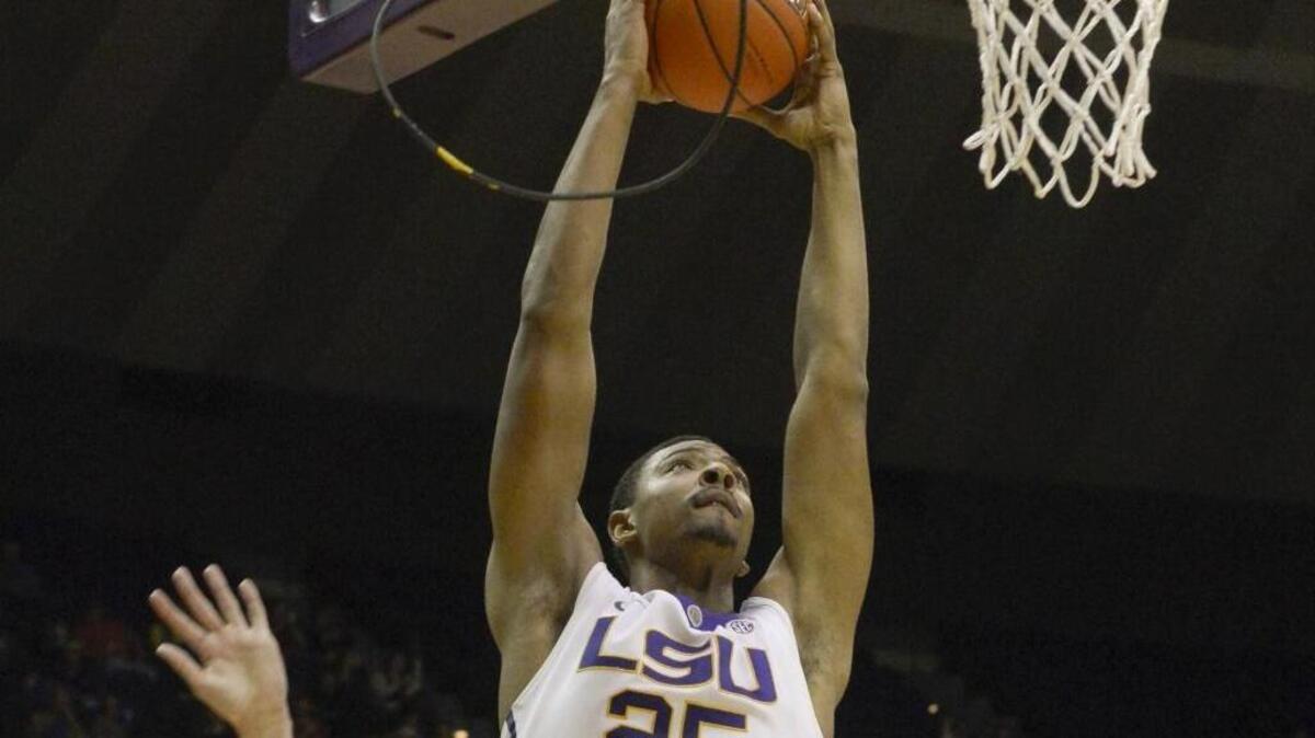 LSU's Jordan Mickey dunks against South Carolina on Jan. 28, 2015. Mickey has spent the past two seasons with the Boston Celtics and is expected to sign with the Miami Heat.