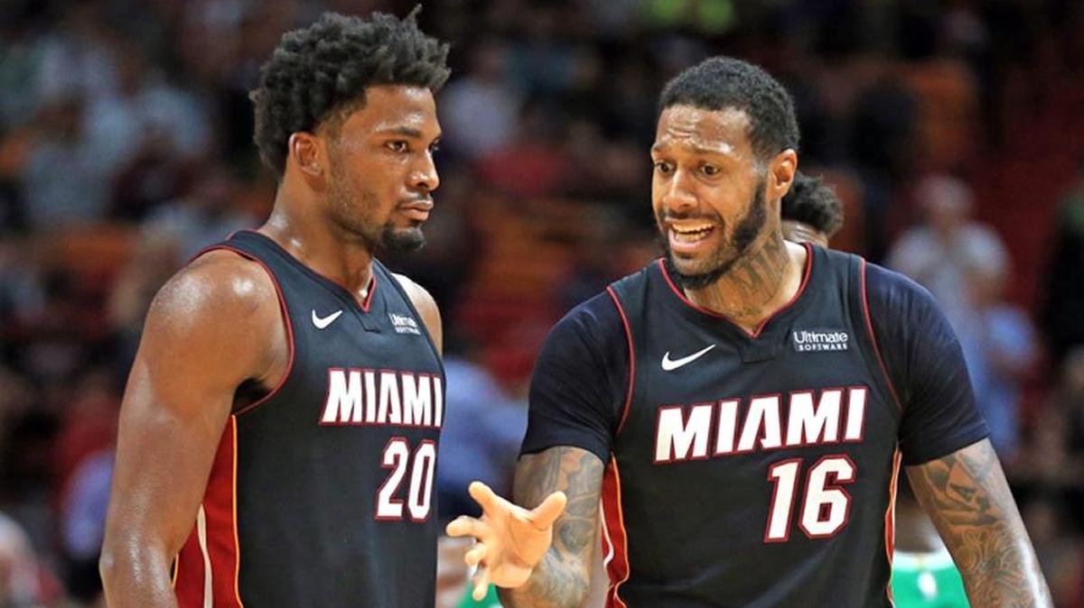 Miami Heat forward Justise Winslow and forward James Johnson talk at mid court during of Boston’s 96-90 win at AmericanAirlines Arena on Saturday, October 28, 2017.