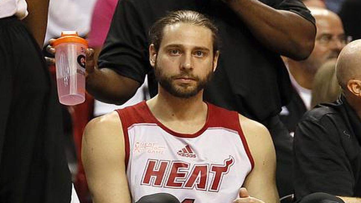 
Josh McRoberts sits on the bench during the Miami Heat's Red, White & Pink Game at AmericanAirlines Arena in Miami on Wednesday, October 1, 2014.
