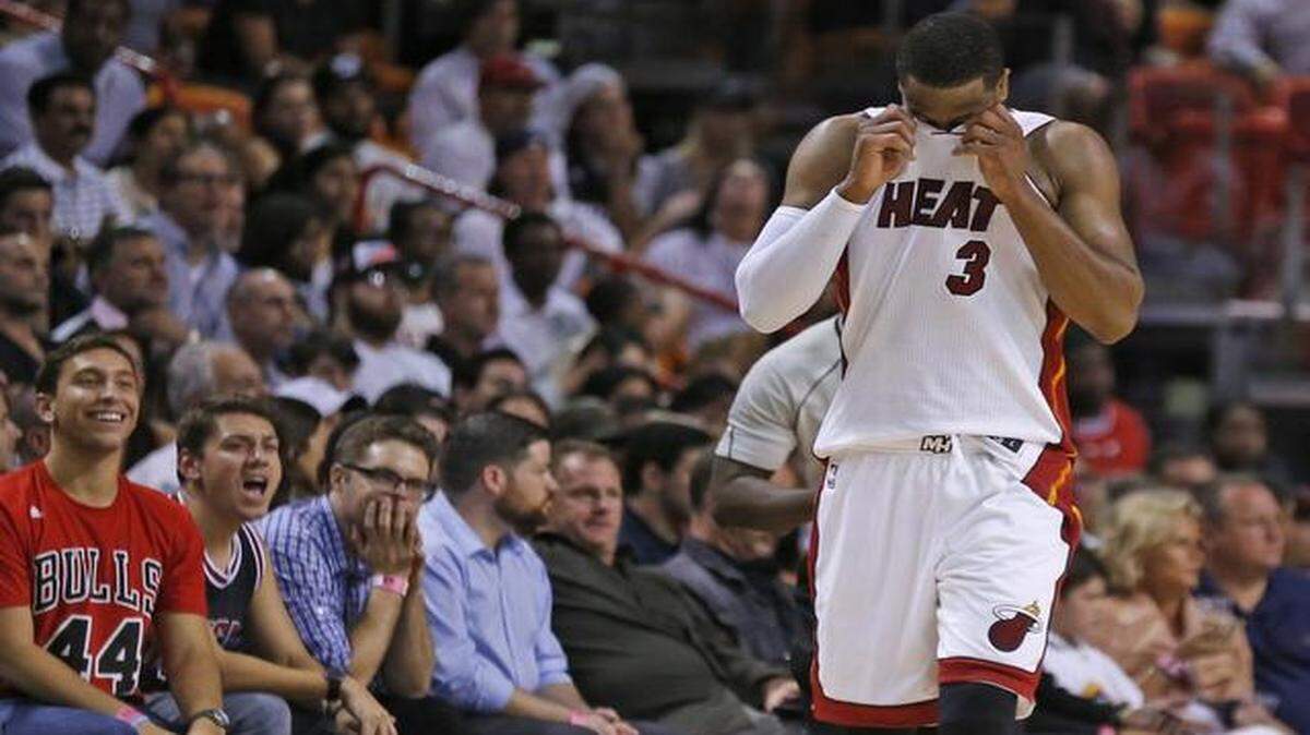 
 Dwyane Wade reacts in the fourth quarter as the Miami Heat hosts the Chicago Bulls at the AmericanAirlines Arena on Thursday, April 9, 2015.
