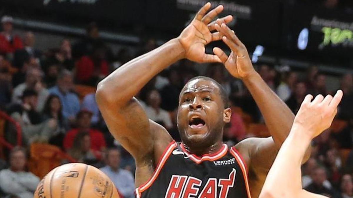Miami Heat Dion Waiters leaps for the basket as Portland Trail Blazers guard Damian Lillard strips the ball from him in the second quarter at the AmericanAirlines Arena in Miami, Florida, December 13, 2017.