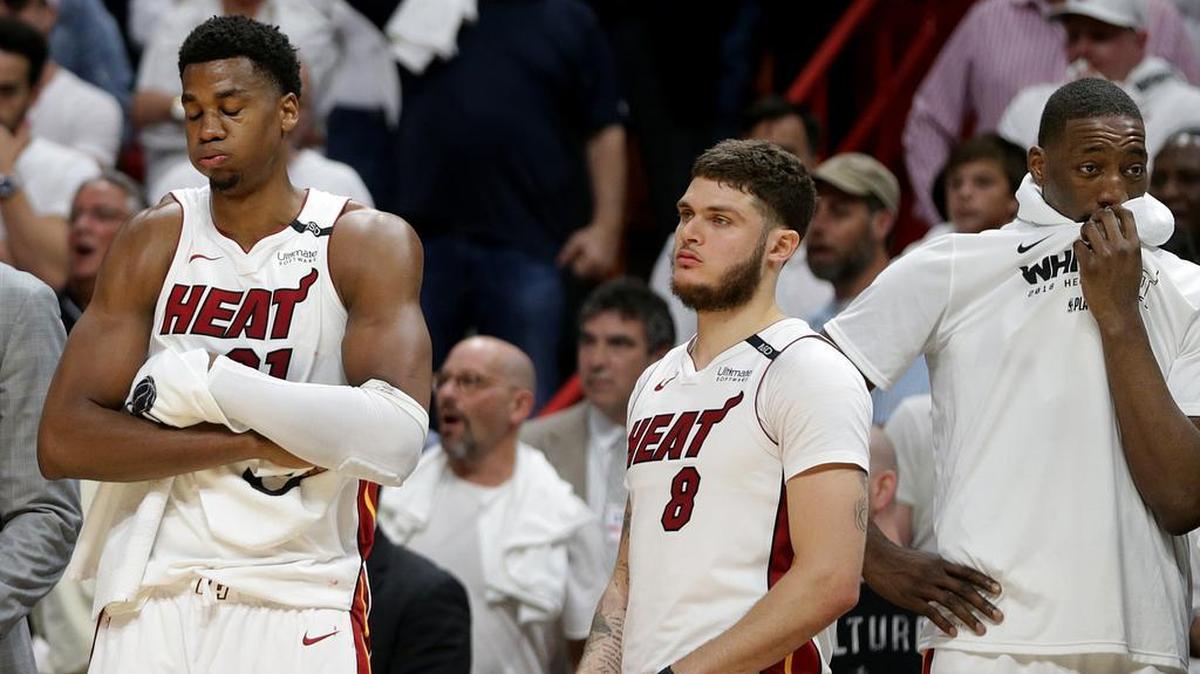 Heat-from left- Hassan Whiteside, Tyler Johnson and Bam Adebayo react as Philadelphia leads with less than minute left in the fourth quarter of the playoff: round 1 game 4 between the Miami Heat and the Philadelphia 76ERS, at AmericanAirlines Arena in Miami on Saturday, April 21, 2018.