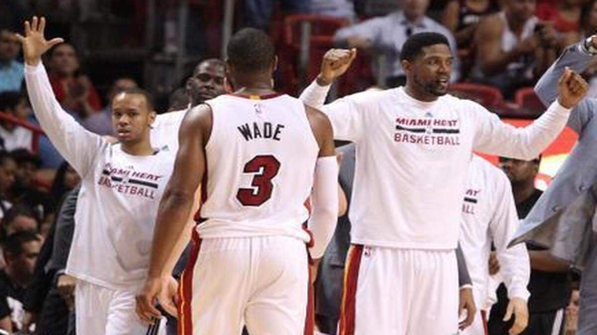 
Miami Heat players celebrate their 104-98 victory against the Brooklyn Nets at AmericanAirlines Arena on Wednesday, March 11, 2015.
