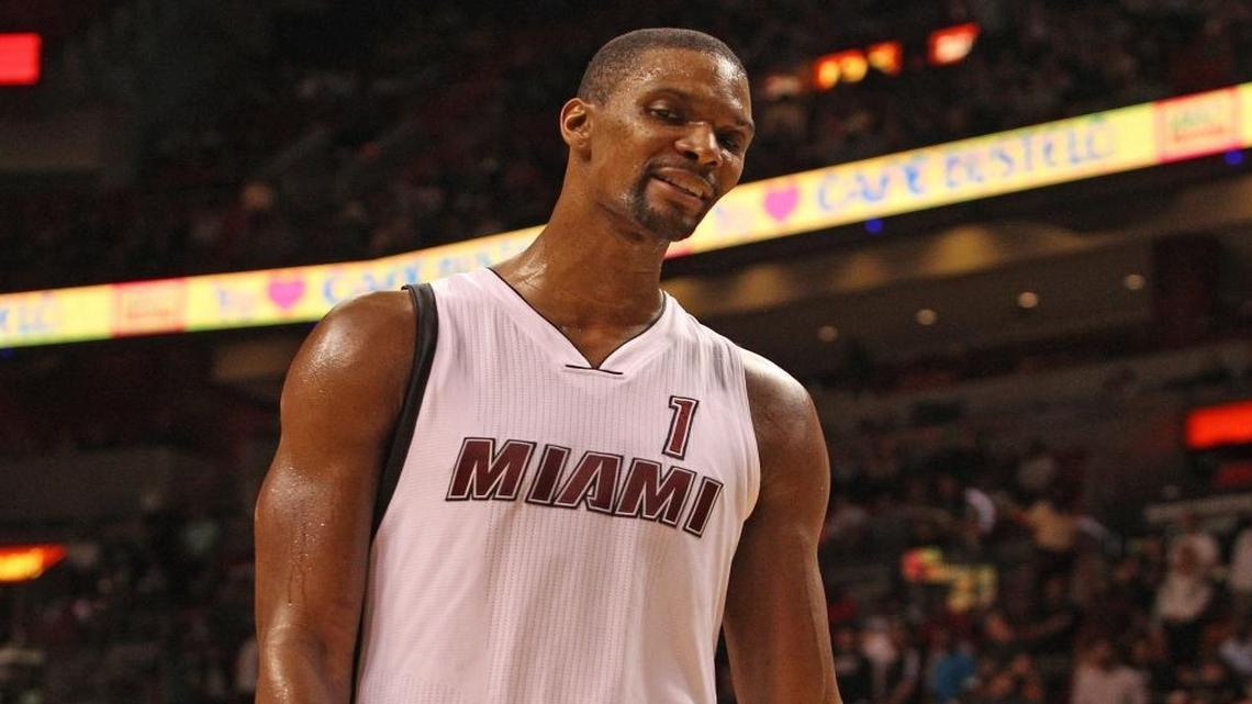 Chris Bosh reacts in the fourth quarter of the Miami Heat’s game against the Washington Wizards on Monday, Dec. 7, 2015 at AmericanAirlines Arena.